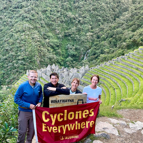 Cyclones traveling with Cyclones Everywhere flag