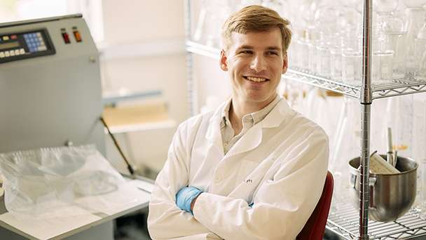 Samuel O'Brien poses in a lab