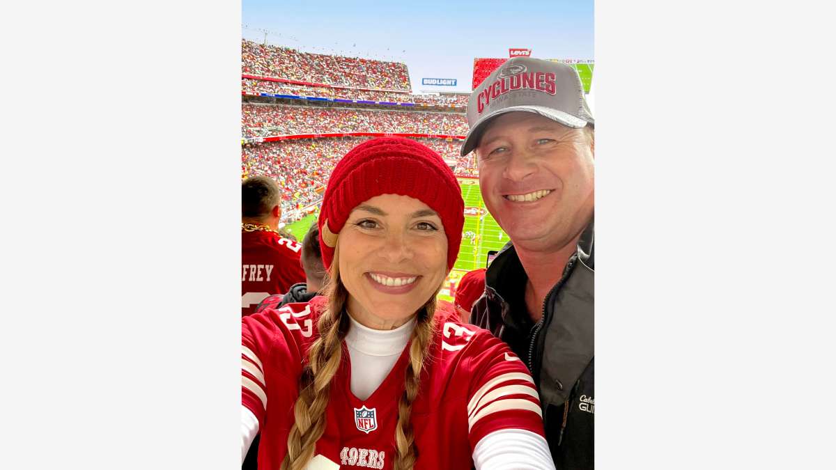 Milissa Forbes Banister and her husband, Jeff, enjoying a football game in San Francisco 