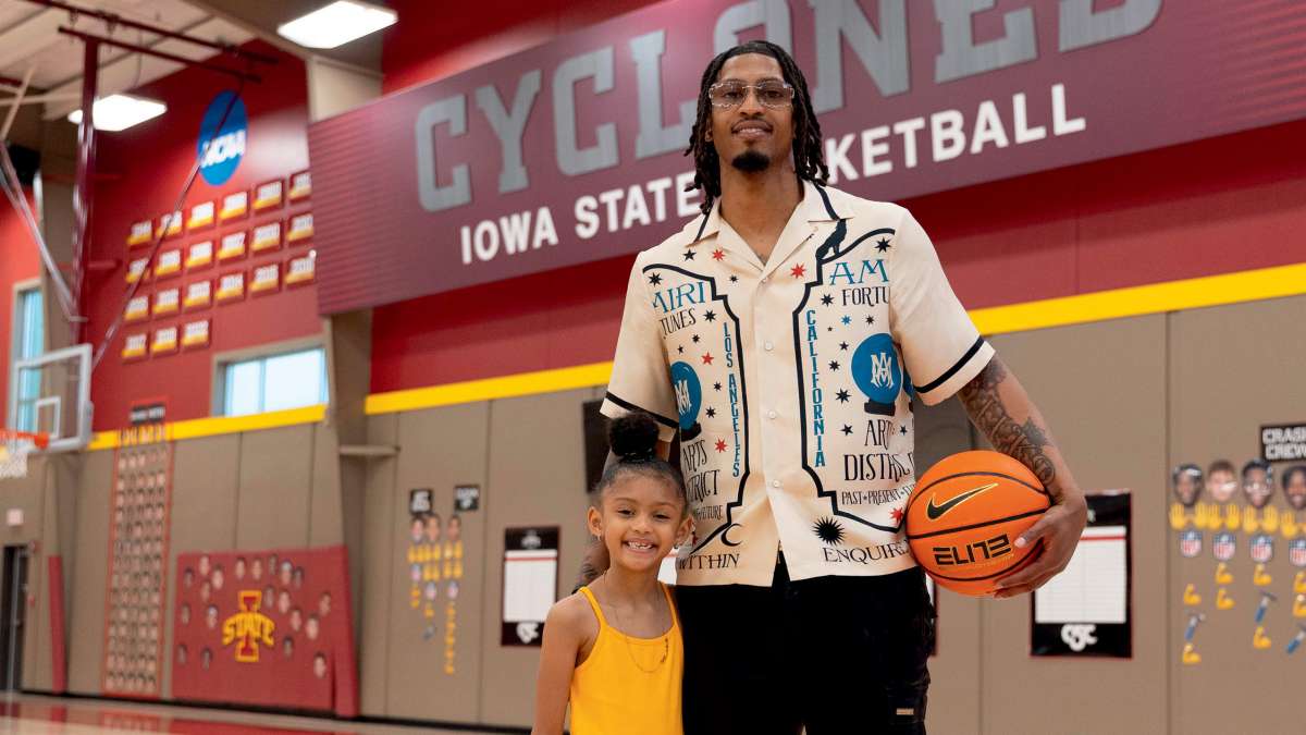 Darrell Bowie, a former Cyclone basketball player, with his daughter, Malia