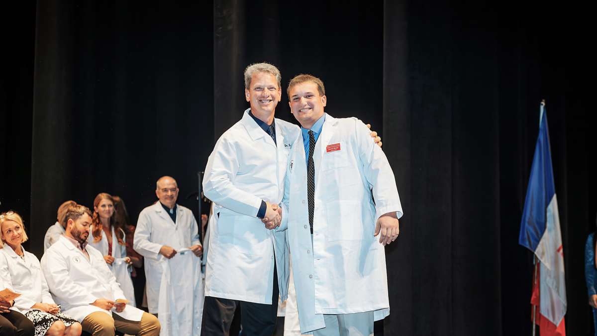 Connor Becker (right) with his father Dr. Khristian Becker.