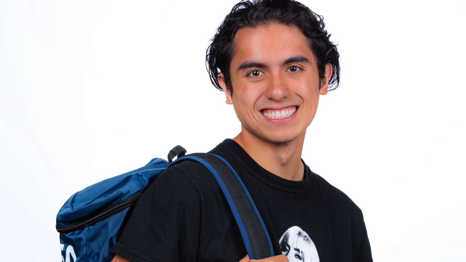 Student Cameron Bristow poses with his backpack.